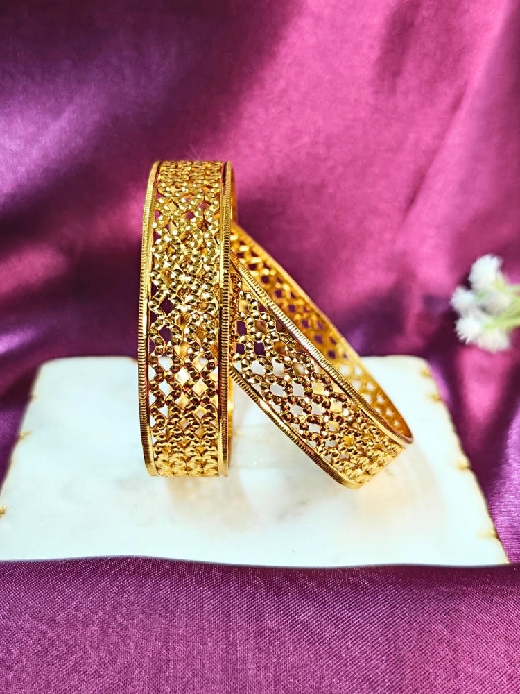 Close-up of an ornate traditional (Gold Polish) Bangles Set. It’s comfortable and lightweight enough for everyday wear, and it also looks absolutely beautiful and elegant. The design is stylish, the finish is impressive, and it feels really pleasant to wear all day.