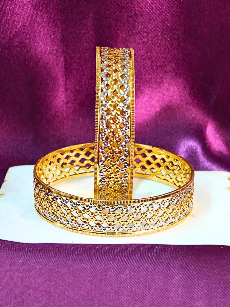 Close-up of an ornate traditional (Gold Polish) Gold & Silver Bangles Set. It’s comfortable and lightweight enough for everyday wear, and it also looks absolutely beautiful and elegant. The design is stylish, the finish is impressive, and it feels really pleasant to wear all day.