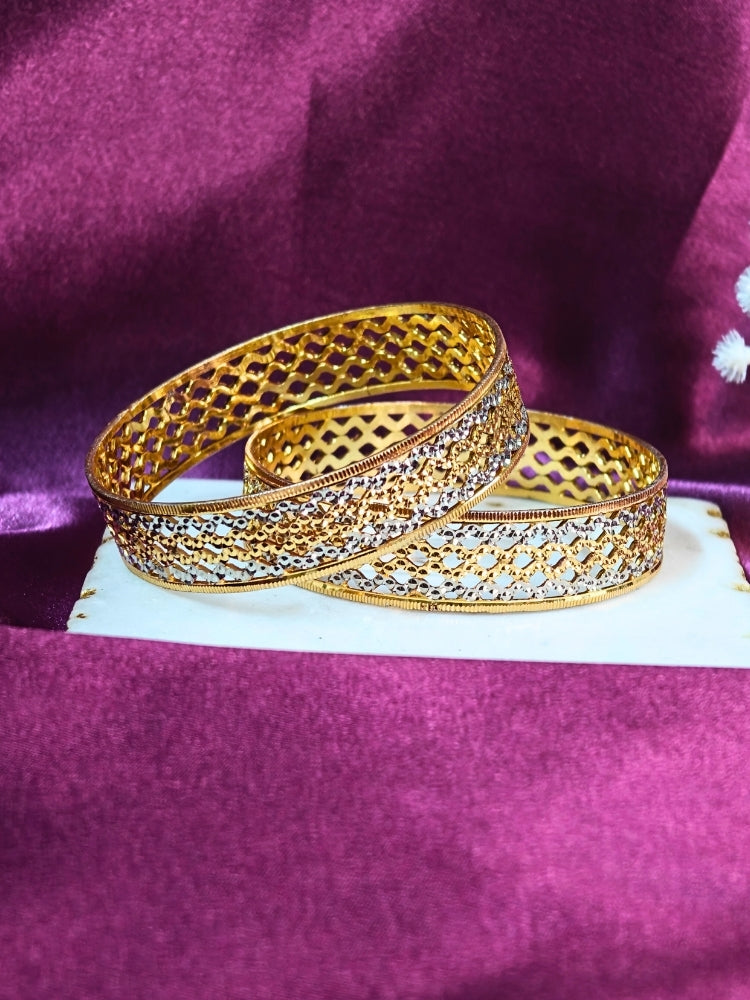 Close-up of an ornate traditional (Gold Polish) Gold & Silver Bangles Set. It’s comfortable and lightweight enough for everyday wear, and it also looks absolutely beautiful and elegant. The design is stylish, the finish is impressive, and it feels really pleasant to wear all day.