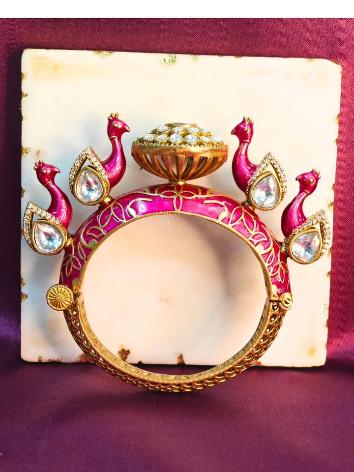 Close-up of an ornate traditional Pink Meenakari Bracelet with Meenakari, American Diamond and Kundan. A vibrant Meenakari artificial jewelry set for celebrations. Close-up of enamel work in Meenakari artificial wedding jewelry.