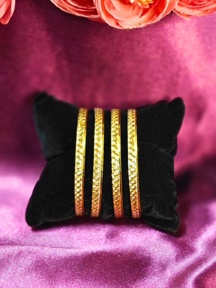 Close-up of an ornate traditional (Gold Polish) Bangles Set. It’s comfortable and lightweight enough for everyday wear, and it also looks absolutely beautiful and elegant. The design is stylish, the finish is impressive, and it feels really pleasant to wear all day.