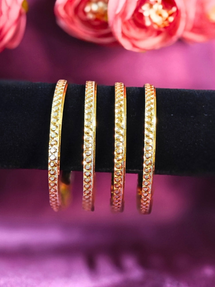 Close-up of an ornate traditional (Gold Polish) Bangles Set. It’s comfortable and lightweight enough for everyday wear, and it also looks absolutely beautiful and elegant. The design is stylish, the finish is impressive, and it feels really pleasant to wear all day.