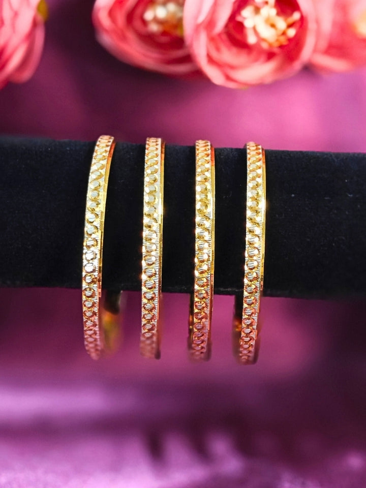Close-up of an ornate traditional (Gold Polish) Bangles Set. It’s comfortable and lightweight enough for everyday wear, and it also looks absolutely beautiful and elegant. The design is stylish, the finish is impressive, and it feels really pleasant to wear all day.