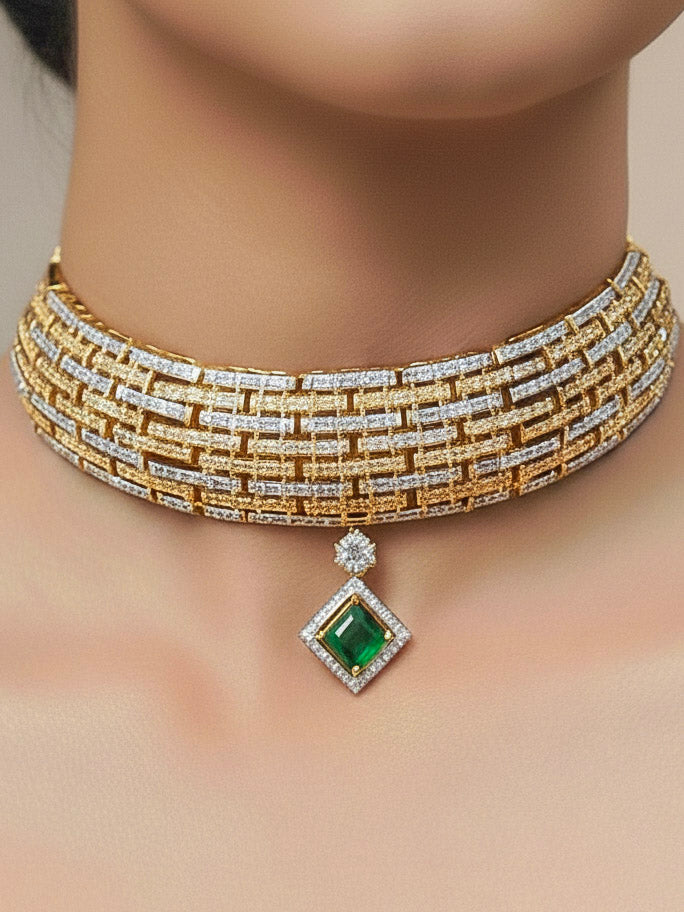 Close-up of a woman wearing an ornate Indo-Western American Diamond gold & Silver Choker jewellery set and earrings with American Diamond and Green Colored Stones. Woman wearing anti-tarnish artificial American Diamond Necklace Set for long functions. Perfect American Diamond necklace set for weddings and festivals.