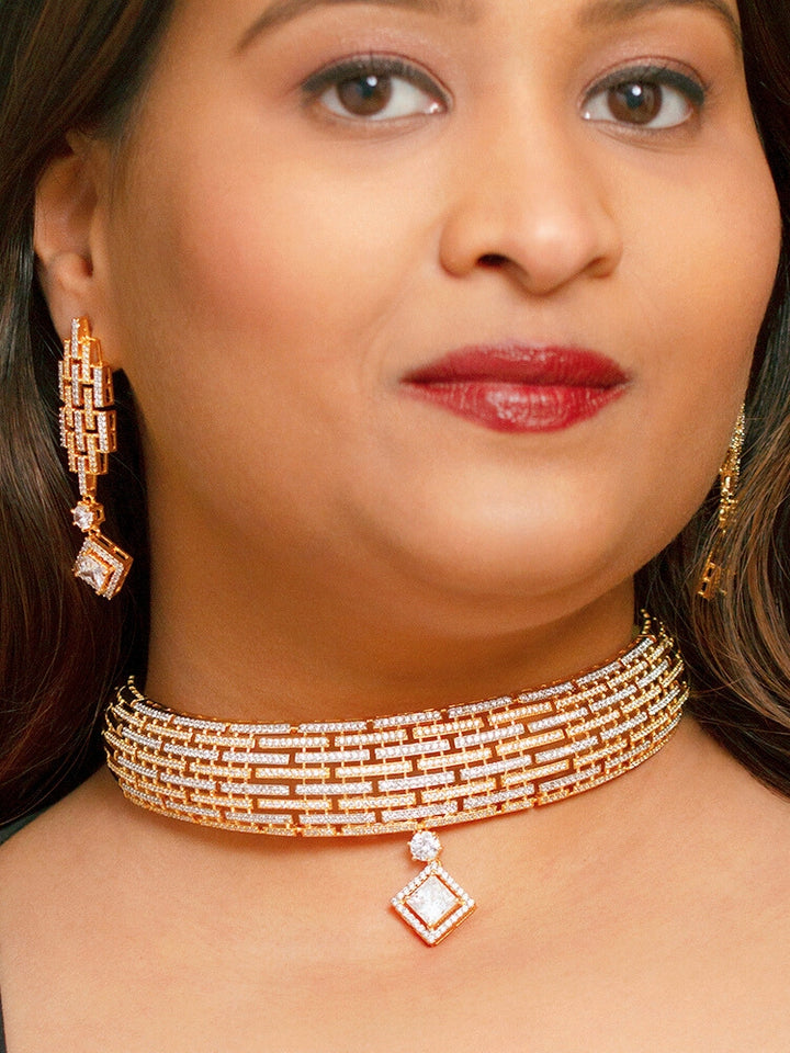 A bride-to-be wearing an exquisite artificial diamond choker necklace and matching earrings, designed for the perfect engagement look. This stunning artificial diamond jewelry set offers luxury and sophistication while being an affordable alternative to natural diamonds.