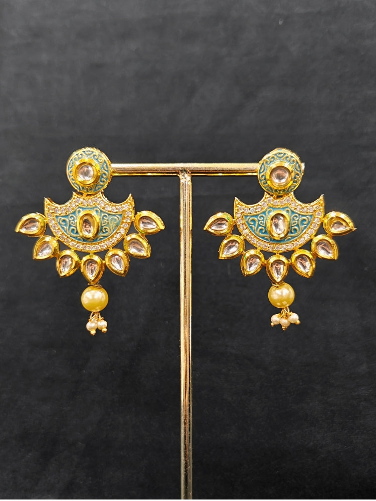 Close-up of an ornate traditional Mint Blue Meenakari Long  jewellery set and earrings with Kundan, Meenakari work, crystal beads, pearls and American Diamond. Close-up of enamel work in Meenakari artificial wedding jewelry. Perfect Meenakari necklace set for weddings and festivals.