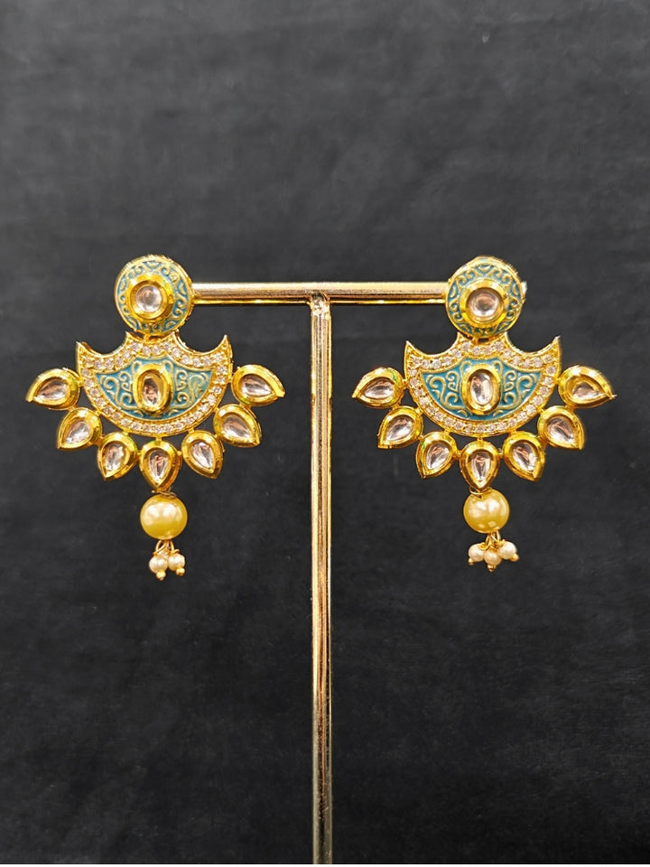 Close-up of an ornate traditional Mint Blue Meenakari Long  jewellery set and earrings with Kundan, Meenakari work, crystal beads, pearls and American Diamond. Close-up of enamel work in Meenakari artificial wedding jewelry. Perfect Meenakari necklace set for weddings and festivals.
