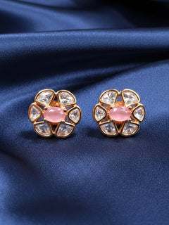 Close-up of an ornate Indo-Western (Rose Gold Polish) Mint Pink Studs Earrings with Mint Pink Colored Stone and Polki. Indo-western outfit styled with a statement Polki Studs Earrings. Perfect and comfortable for office or everyday use.