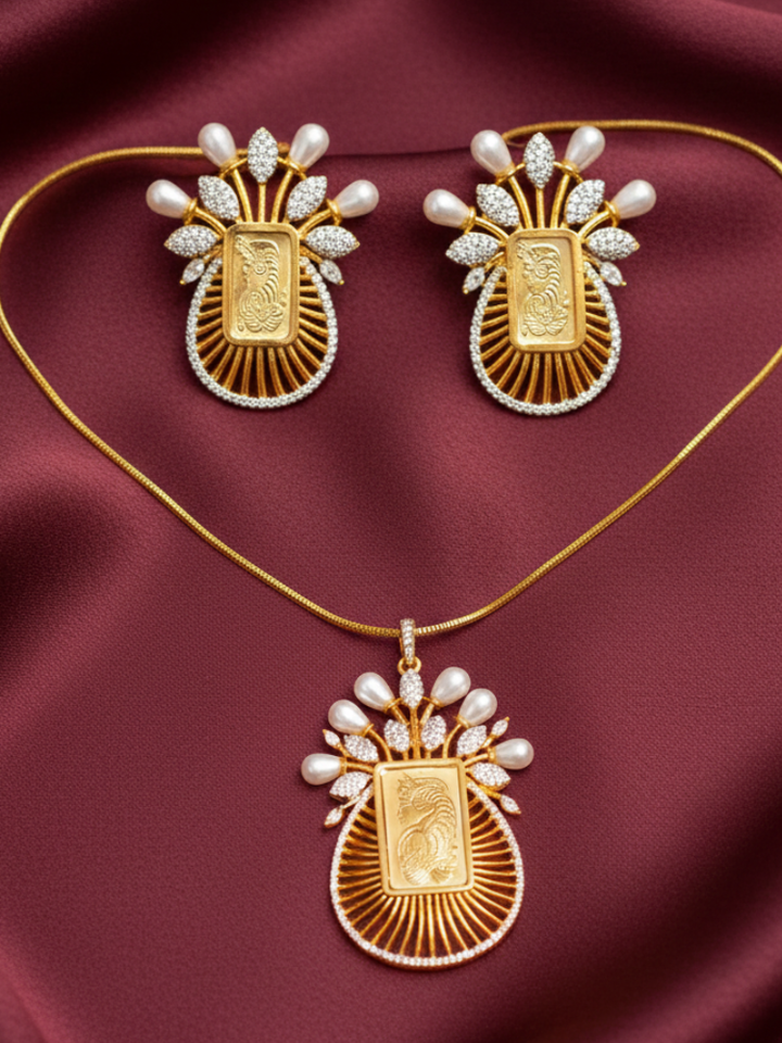Close-up of an ornate traditional (Bright Gold Polish) Ginni jewellery set and earrings with American Diamond and Pearls. Party wear outfit completed with a lightweight American diamond Pendant Set. Close-up of a cocktail party look featuring a premium American diamond Pendant.
