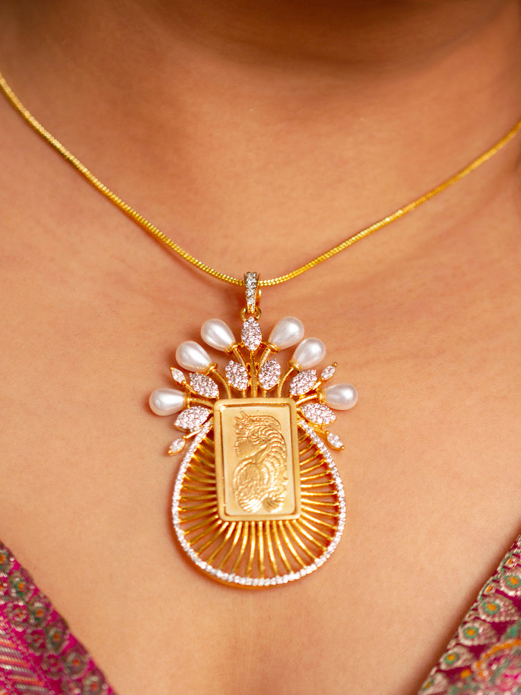 Close-up of a woman wearing an ornate traditional (Bright Gold Polish) Ginni jewellery set and earrings with American Diamond and Pearls. Party wear outfit completed with a lightweight American diamond Pendant Set. Close-up of a cocktail party look featuring a premium American diamond Pendant.