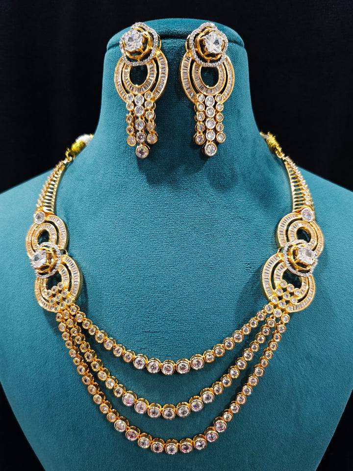 Close-up of an ornate Indo-Western jewellery set and earrings with American Diamond . Elegant Party look with a high-quality imitation American diamond necklace set. A graceful woman wearing a trending American diamond necklace for a 2026 wedding celebration.