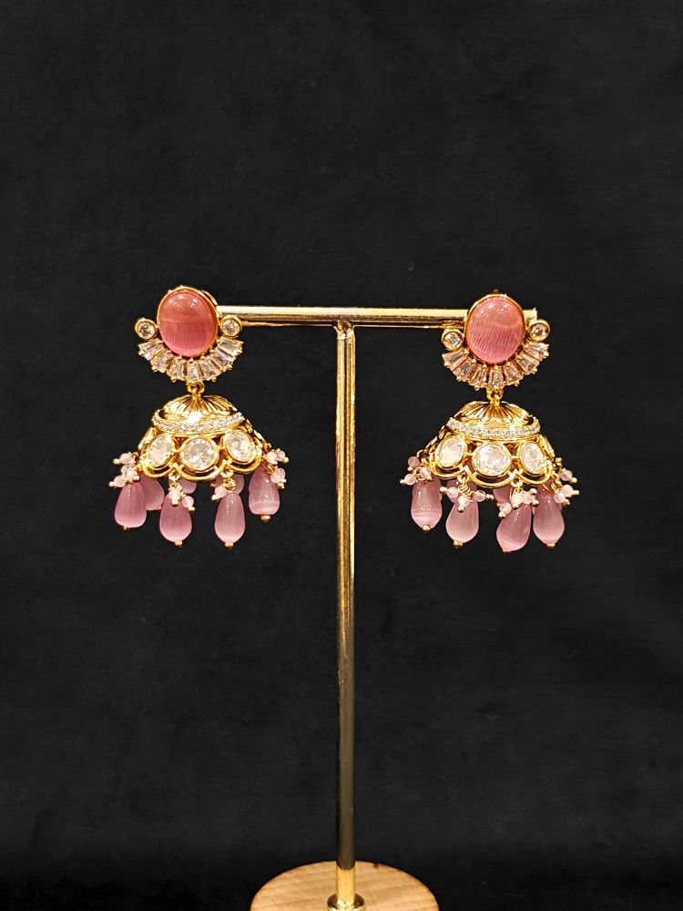 Close-up of an ornate traditional (Gold Polish) Choker Mint Pink jewellery set and earrings with Crystal Beads, Polki, American Diamond, Colored Stones and Pearls. Festive Diwali look enhanced with a premium Polki artificial necklace. Festive saree look completed with Polki artificial jewelry set.