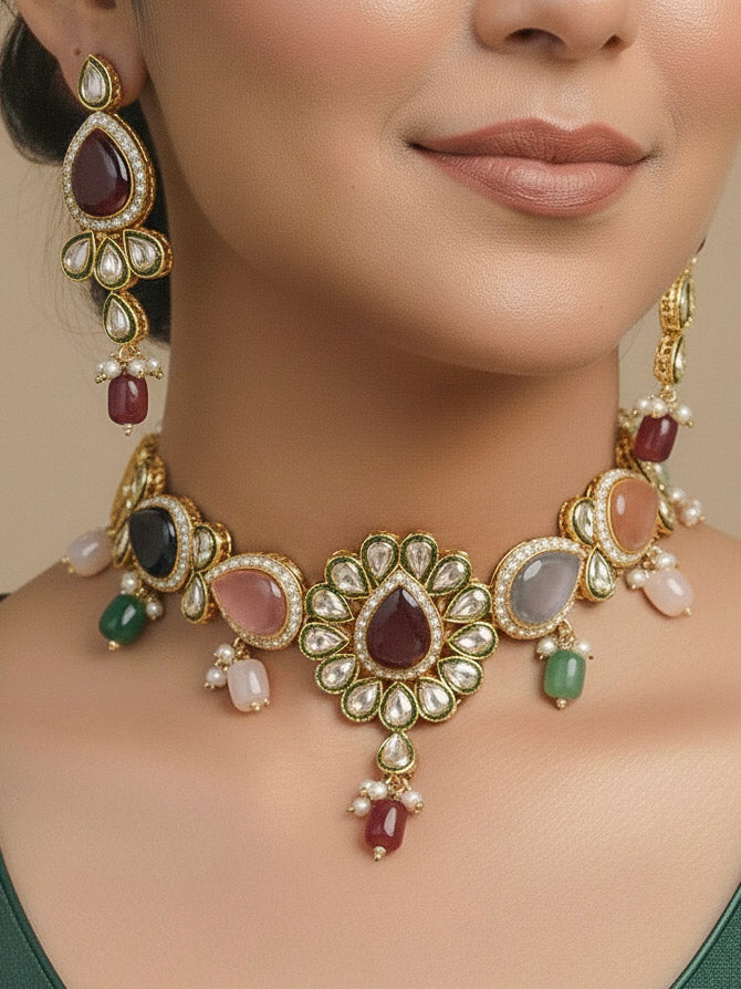 Close-up of a woman wearing an ornate traditional Multi-Color Choker jewellery set and earrings and maangtikka with Kundan, Monalisa Stone, American Diamonds, Beads and Reverse American Diamonds and tumble stones. A graceful woman wearing a trending Colored Stone necklace for a 2026 wedding celebration. Elegant wedding jewelry look featuring a premium artificial Colored Stone necklace.