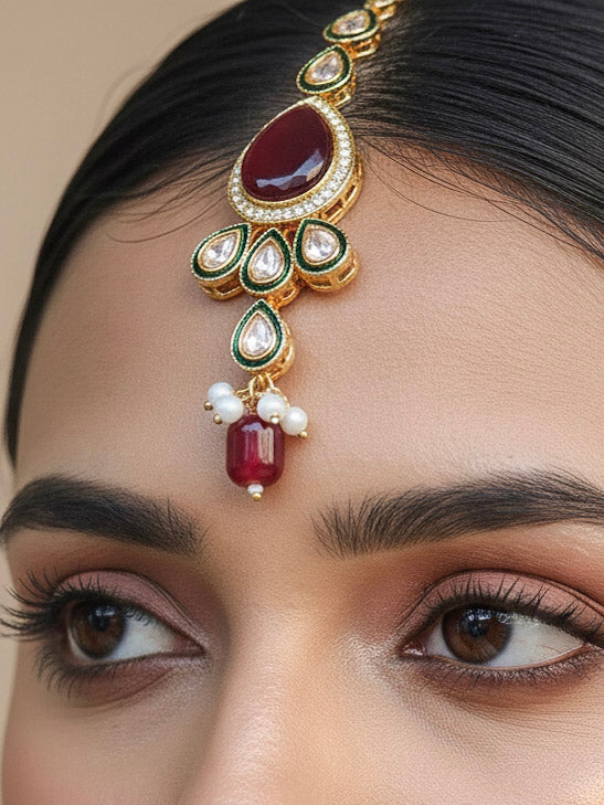 Close-up of a woman wearing an ornate traditional Multi-Color Choker jewellery set and earrings and maangtikka with Kundan, Monalisa Stone, American Diamonds, Beads and Reverse American Diamonds and tumble stones. A graceful woman wearing a trending Colored Stone necklace for a 2026 wedding celebration. Elegant wedding jewelry look featuring a premium artificial Colored Stone necklace.