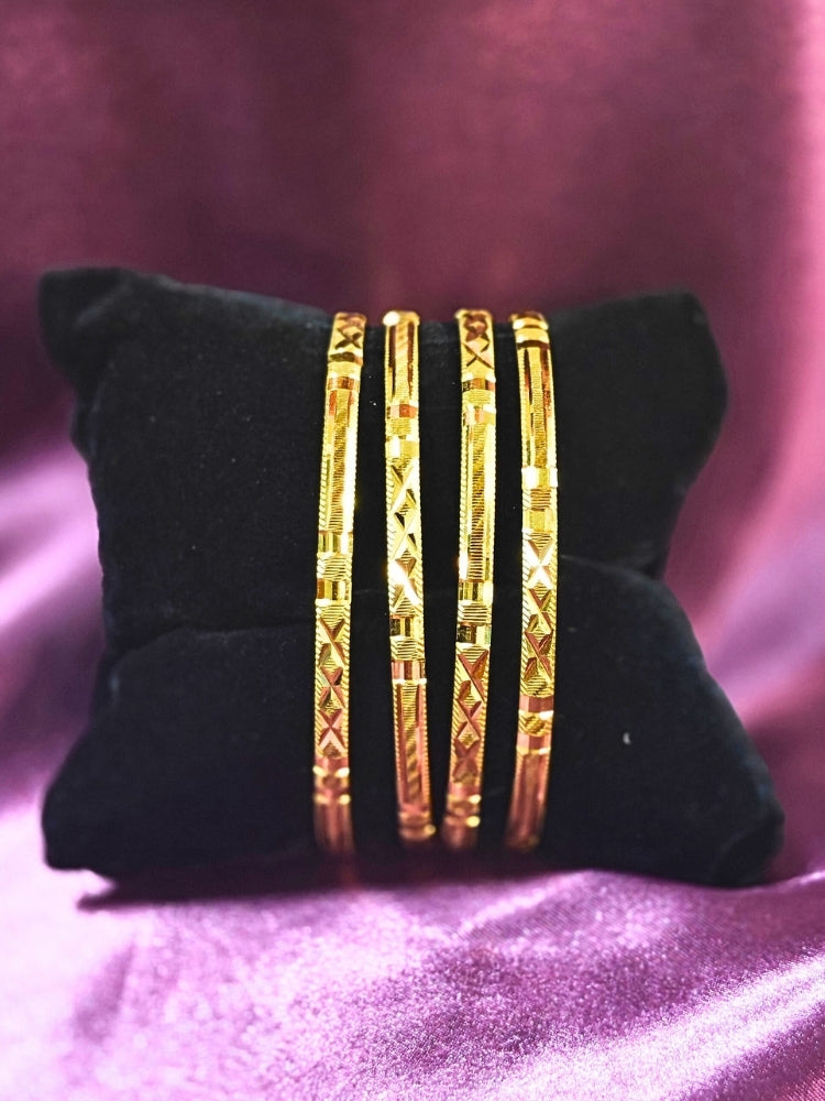 Close-up of an ornate traditional (Gold Polish) Bangles Set. It’s comfortable and lightweight enough for everyday wear, and it also looks absolutely beautiful and elegant. The design is stylish, the finish is impressive, and it feels really pleasant to wear all day.
