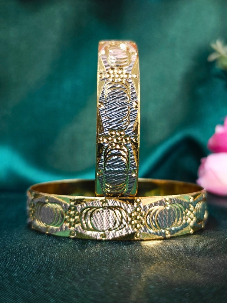 Close-up of an ornate traditional (Gold Polish) Gold & Silver  Bangles Set. It’s comfortable and lightweight enough for everyday wear, and it also looks absolutely beautiful and elegant. The design is stylish, the finish is impressive, and it feels really pleasant to wear all day.
