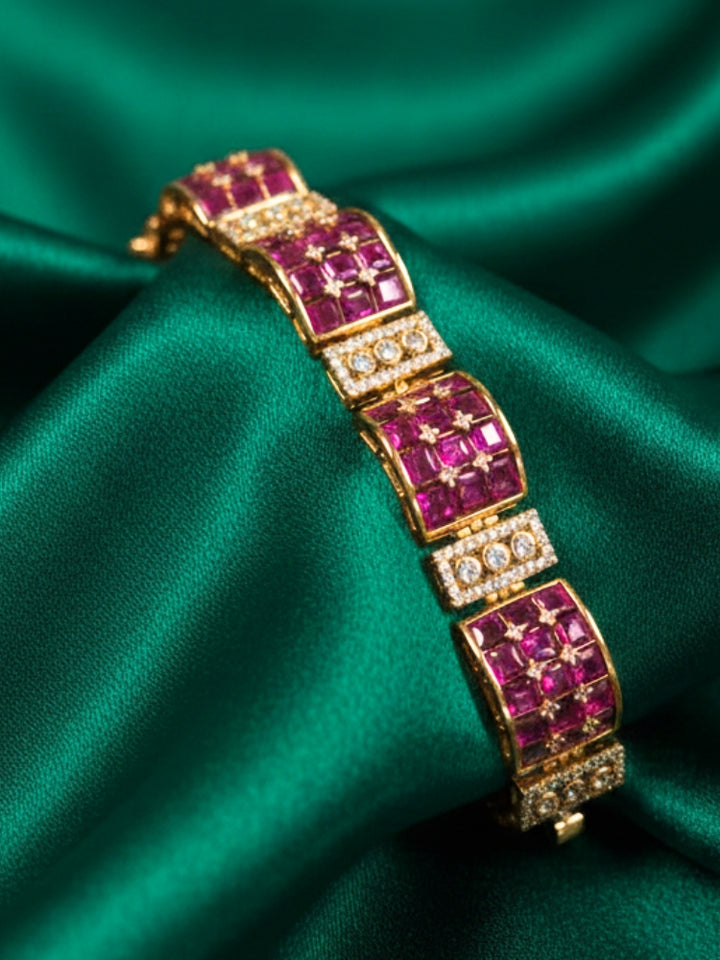 Close-up of an ornate Indo-western American Diamond Pink Bracelet with Pink Colored Stones, American Diamond and filligree Work. Reception-ready look featuring a statement American diamond Bracelet. Close-up of a cocktail party look featuring a premium American diamond Bracelet.