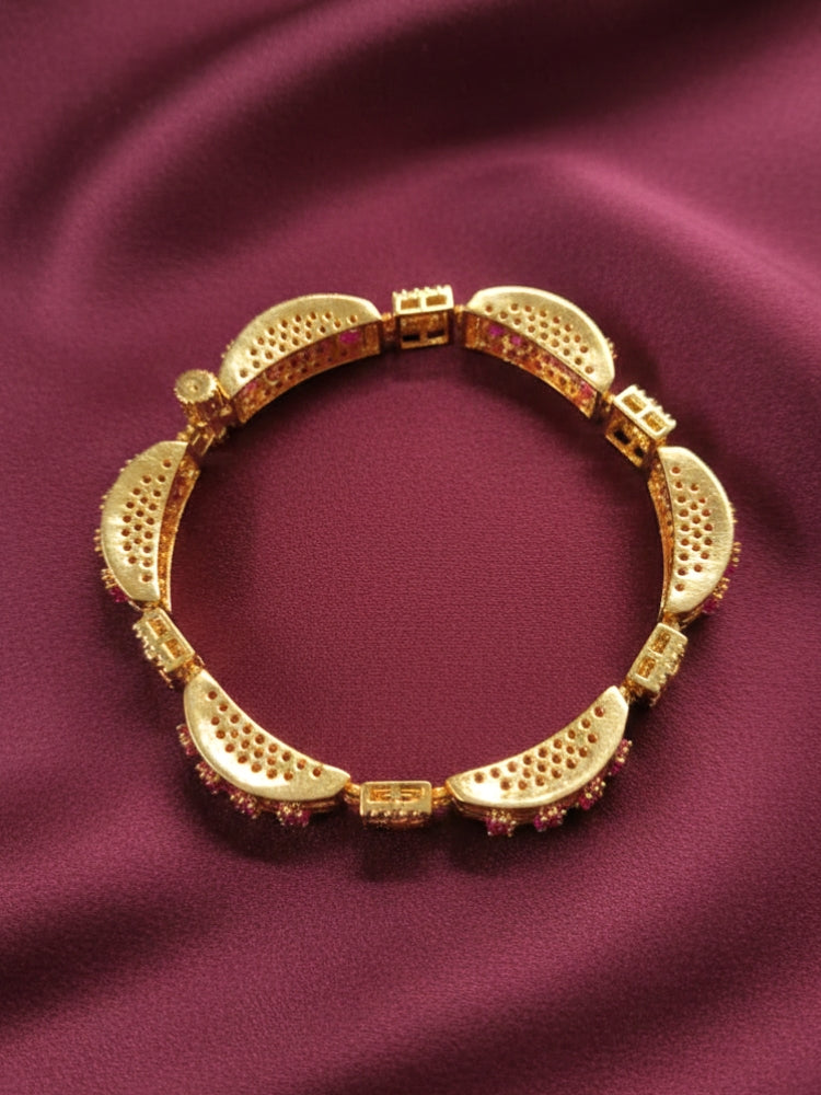 Close-up of an ornate Indo-western American Diamond Pink Bracelet with Pink Colored Stones, American Diamond and filligree Work. Reception-ready look featuring a statement American diamond Bracelet. Close-up of a cocktail party look featuring a premium American diamond Bracelet.