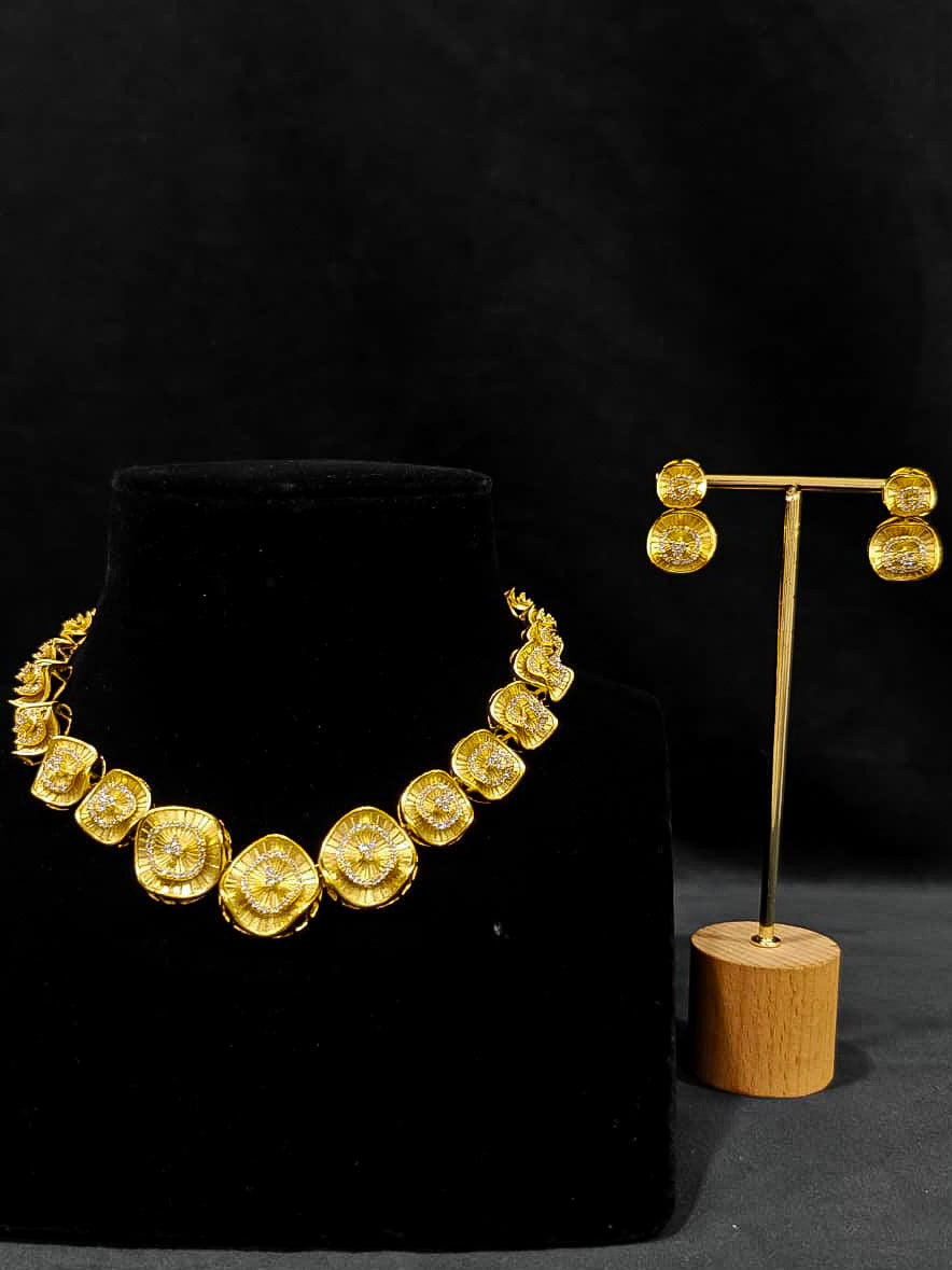 An elegant artificial diamond necklace and matching earrings. This premium artificial diamond jewelry set is perfect for special occasions, from Indian weddings to engagement parties, offering sophisticated glamour without the high price tag.