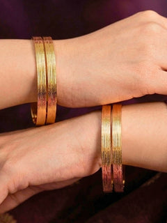 Close-up of an a women wearing ornate traditional (Gold Polish) Bangles Set. It’s comfortable and lightweight enough for everyday wear, and it also looks absolutely beautiful and elegant. The design is stylish, the finish is impressive, and it feels really pleasant to wear all day.