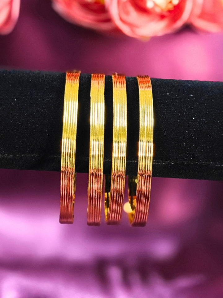 Close-up of an ornate traditional (Gold Polish) Bangles Set. It’s comfortable and lightweight enough for everyday wear, and it also looks absolutely beautiful and elegant. The design is stylish, the finish is impressive, and it feels really pleasant to wear all day.
