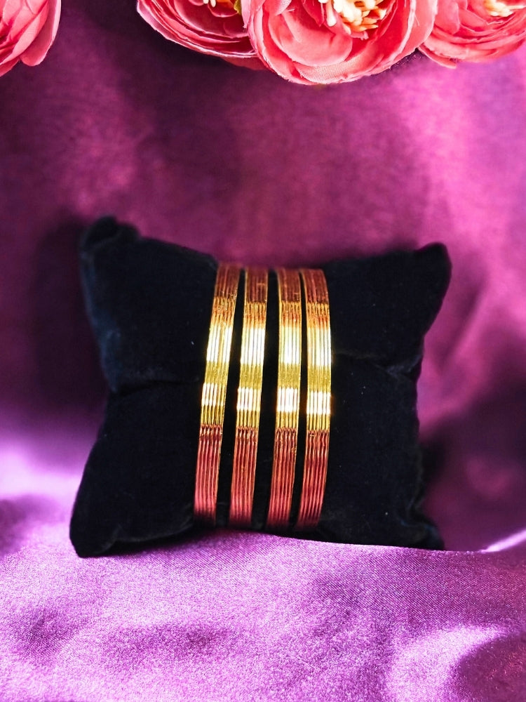 Close-up of an ornate traditional (Gold Polish) Bangles Set. It’s comfortable and lightweight enough for everyday wear, and it also looks absolutely beautiful and elegant. The design is stylish, the finish is impressive, and it feels really pleasant to wear all day.
