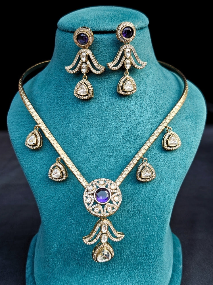 A beautiful an elegant artificial diamond hasli necklace and matching earrings. This premium artificial diamond jewelry set is perfect for special occasions, from Indian weddings to engagement parties, offering sophisticated glamour without the high price tag