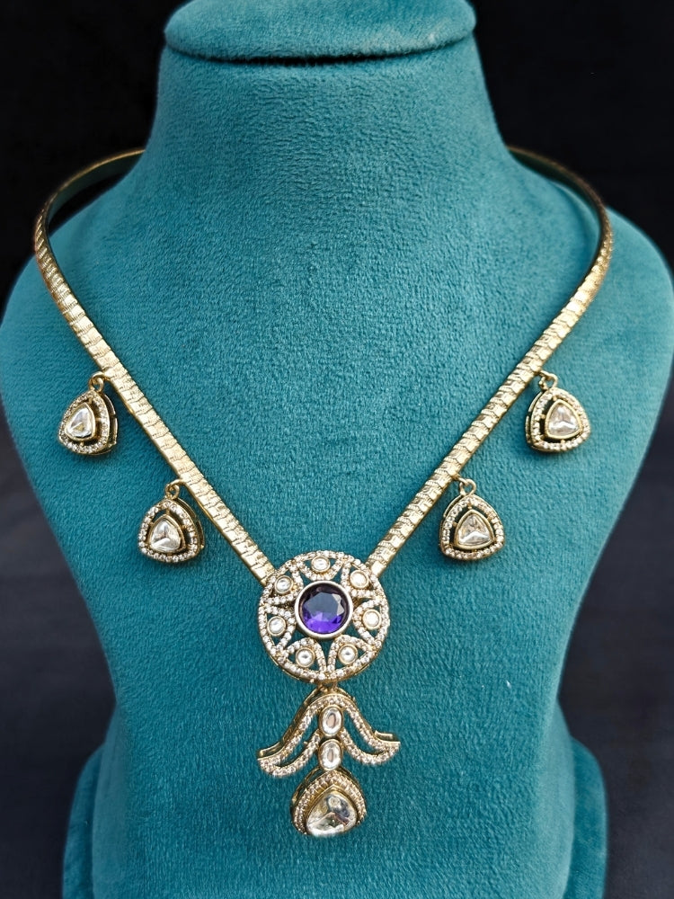 A beautiful an elegant artificial diamond hasli necklace and matching earrings. This premium artificial diamond jewelry set is perfect for special occasions, from Indian weddings to engagement parties, offering sophisticated glamour without the high price tag