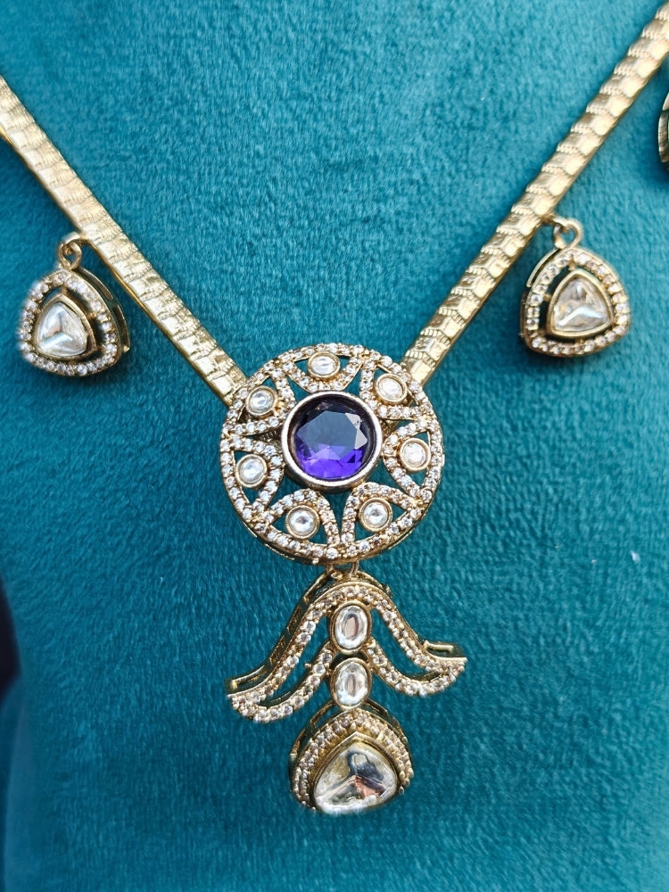 A beautiful an elegant artificial diamond hasli necklace and matching earrings. This premium artificial diamond jewelry set is perfect for special occasions, from Indian weddings to engagement parties, offering sophisticated glamour without the high price tag
