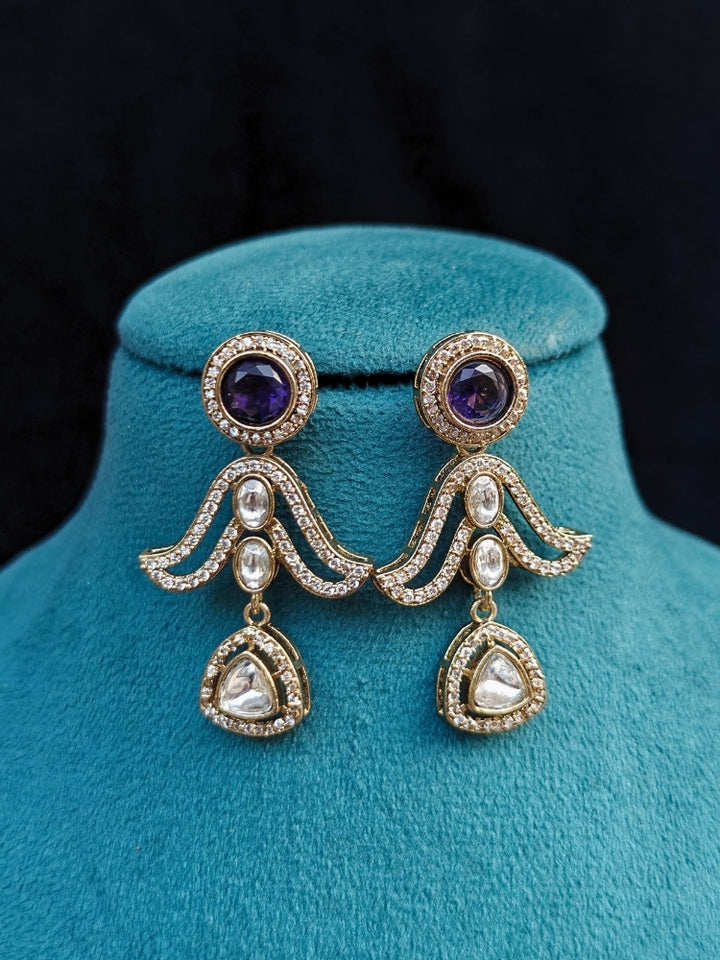 A beautiful an elegant artificial diamond hasli necklace and matching earrings. This premium artificial diamond jewelry set is perfect for special occasions, from Indian weddings to engagement parties, offering sophisticated glamour without the high price tag