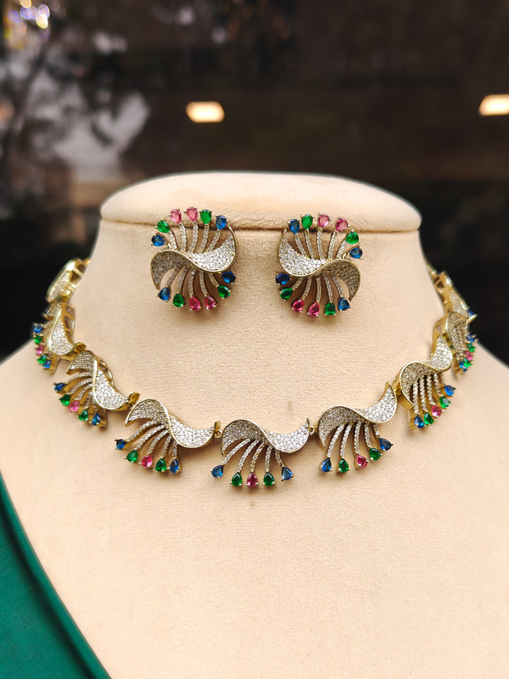 "A woman in a traditional saree, wearing a gorgeous artificial diamond and colored stone necklace paired with diamond earrings. This artificial diamond jewelry set offers a traditional yet modern touch for Indian brides, designed to add elegance and sophistication to any occasion."