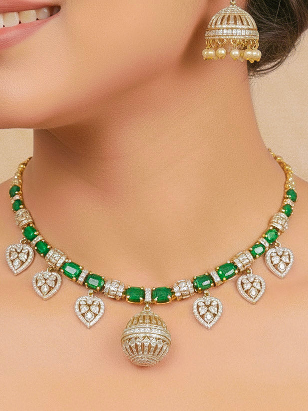 Close-up of a woman wearing an ornate traditional Green Mehendi gold Polish Collar jewellery set and earrings with American Diamond and Green Colored Stones. Mehendi function outfit styled with a lightweight Colored Stone necklace. Festive celebration look featuring a Colored Stone artificial necklace.