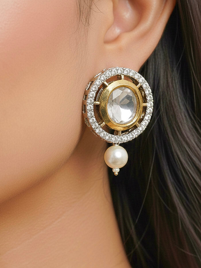 Close-up of a woman wearing an ornate traditional White Choker jewellery set and earrings with Kundan, American Diamond, Crystal Beads and Pearls. Festive saree styling with a premium artificial Pearls necklace. Mehendi ceremony look completed with a handcrafted Pearls jewelry set.