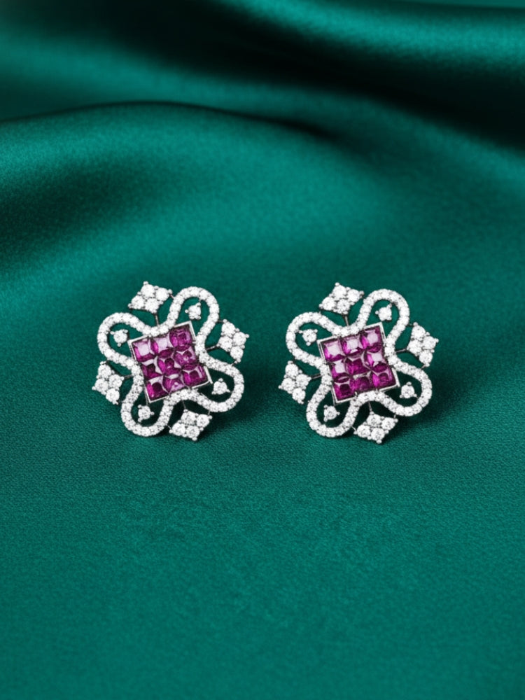 Close-up of an ornate Western (Silver Polish) Pink Diamond Studs Earrings with American Diamond. western dress styled with lightweight artificial American Diamond studs earrings. Wear in office and everyday.