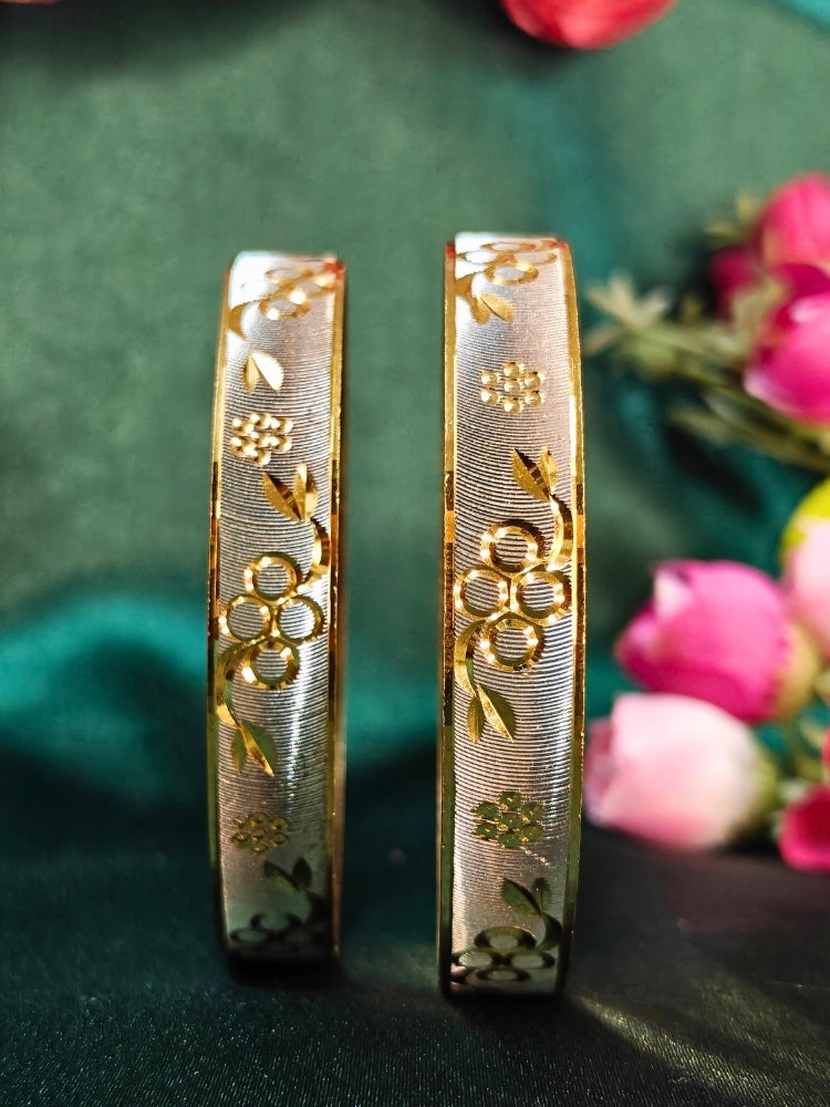 Close-up of an ornate traditional (Gold Polish) Gold & Silver Bangles Set. It’s comfortable and lightweight enough for everyday wear, and it also looks absolutely beautiful and elegant. The design is stylish, the finish is impressive, and it feels really pleasant to wear all day. 