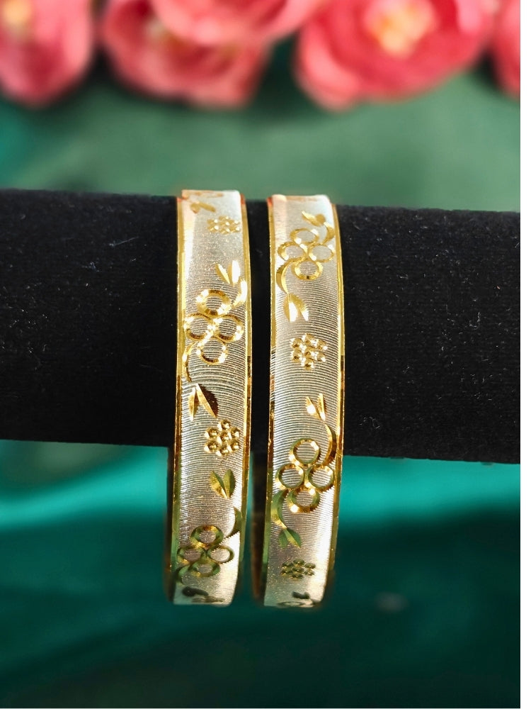 Close-up of an ornate traditional (Gold Polish) Gold & Silver Bangles Set. It’s comfortable and lightweight enough for everyday wear, and it also looks absolutely beautiful and elegant. The design is stylish, the finish is impressive, and it feels really pleasant to wear all day. 