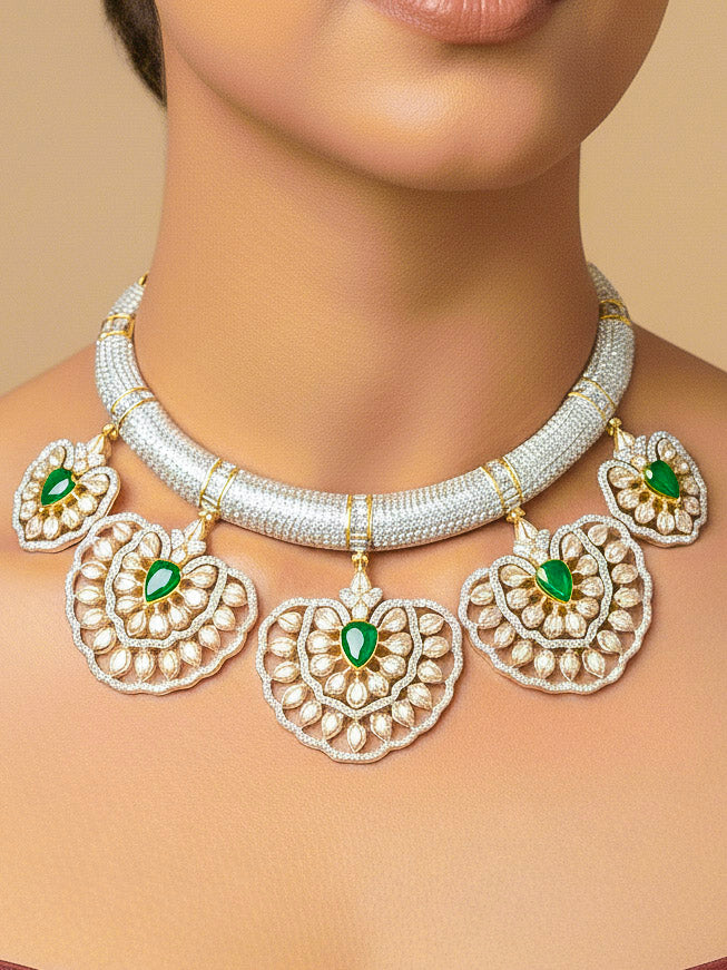 Close-up of a woman wearing an ornate Western American diamond Raizel Emerald Green Necklace Set (Dual Tone) Collar jewellery set and earrings with  Colored Stone and American Diamond. Bride-to-be styled in a premium American diamond artificial necklace for her reception party.