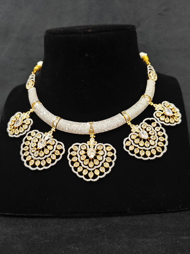Close-up of an ornate Western American diamond Raizel Necklace Set (Dual Tone) Collar jewellery set and earrings with American Diamond. Bride-to-be styled in a premium American diamond artificial necklace for her reception party.