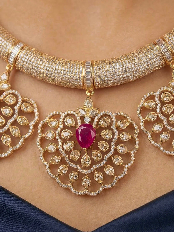 Close-up of a woman wearing an ornate Western American diamond Raizel Ruby Pink Necklace Set (Mehendi Polish) Collar jewellery set and earrings with Colored Stone and American Diamond. Woman styling a statement American diamond necklace with an off-shoulder gown for a reception.