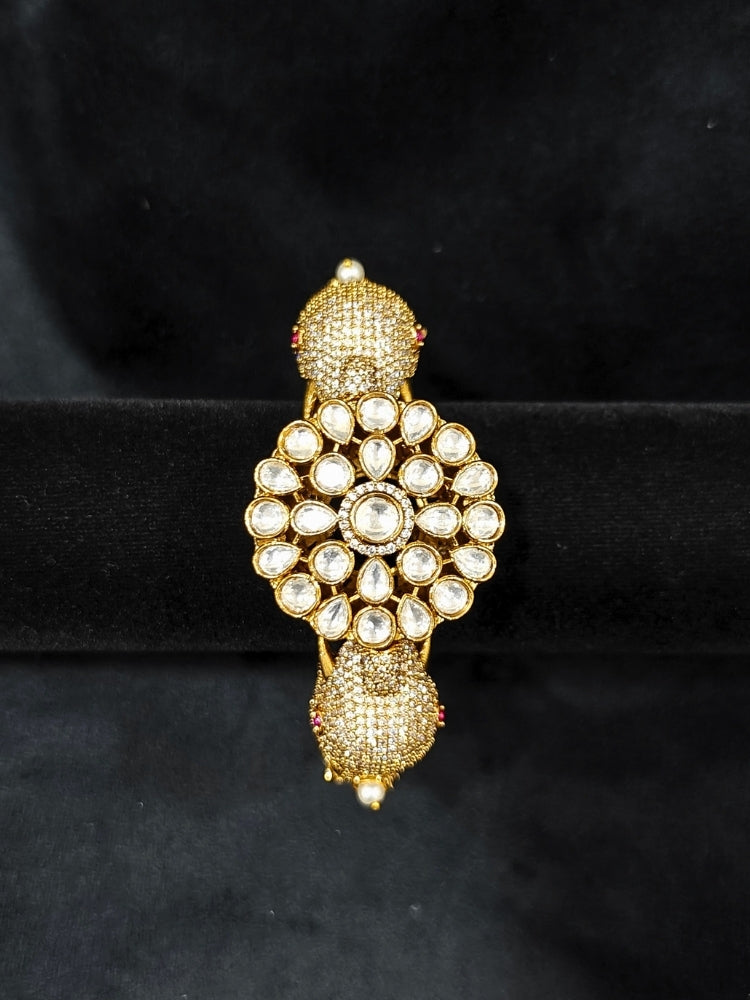 Close-up of an ornate traditional Diamond Mint Green Bracelet with American Diamond, Meenakari and Kundan. Festive Diwali outfit styled with an American diamond artificial Bracelet. Wedding guest wearing a minimal artificial American Diamond bracelet.