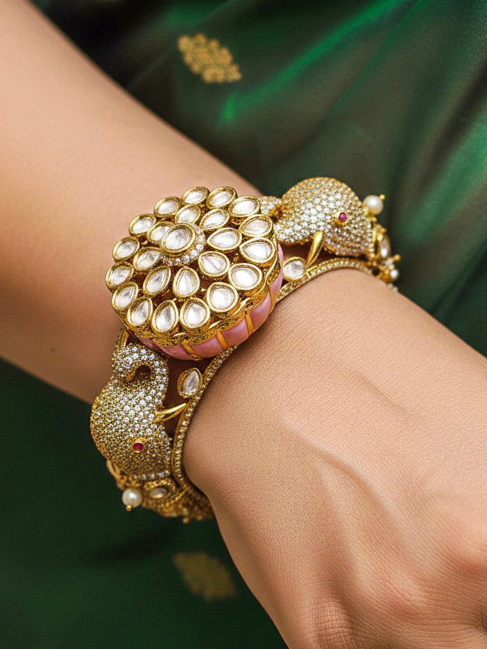 Close-up of a woman wearing an ornate traditional Diamond Mint pink Bracelet with American Diamond, Meenakari and Kundan. Festive Diwali outfit styled with an American diamond artificial Bracelet. Wedding guest wearing a minimal artificial American Diamond bracelet.