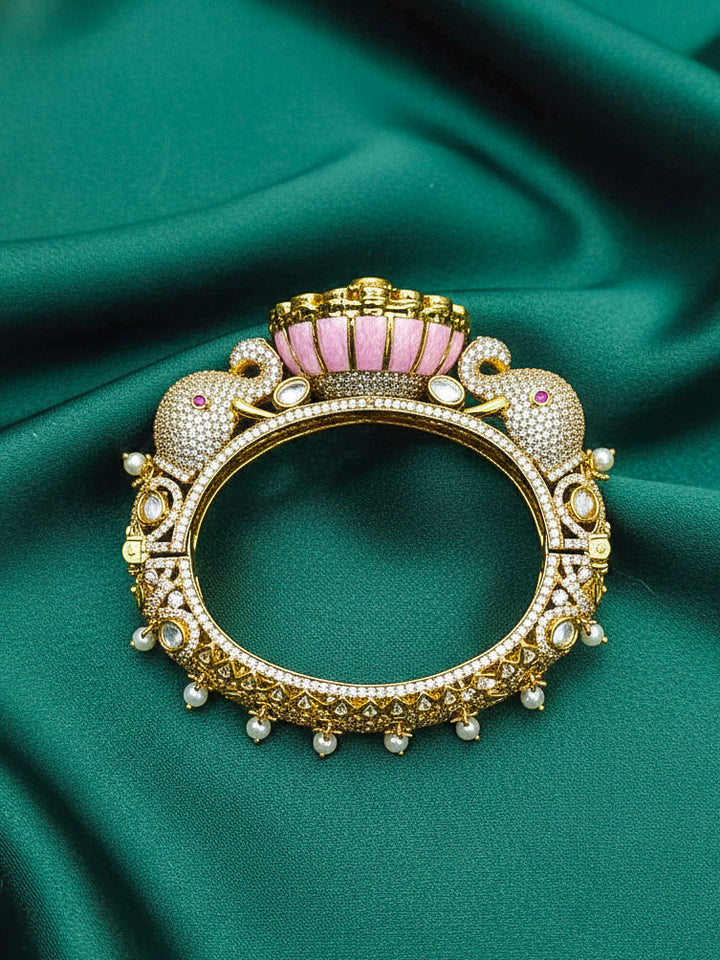 Close-up of an ornate traditional Diamond Mint pink Bracelet with American Diamond, Meenakari and Kundan. Festive Diwali outfit styled with an American diamond artificial Bracelet. Wedding guest wearing a minimal artificial American Diamond bracelet.