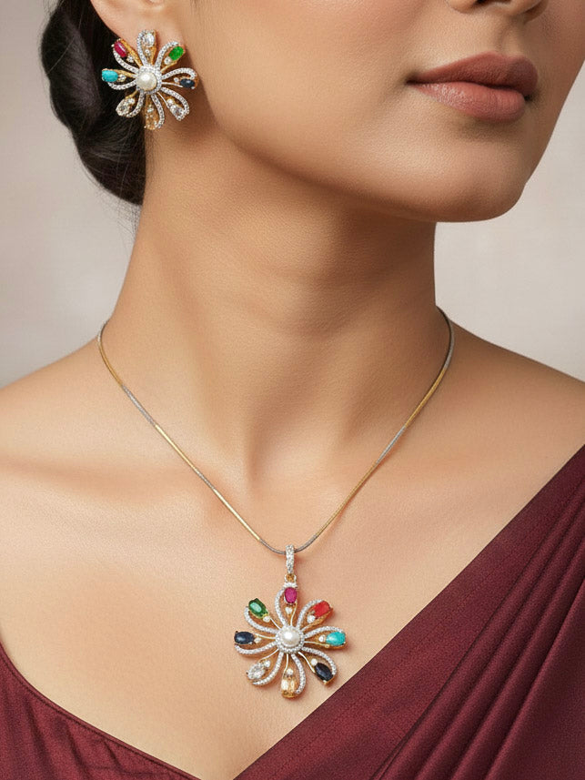 Close-up of a woman wearing an ornate Indo-Western Multi-Color (gold Polish) Pendant set and earrings with American Diamond and Colored Stones. Mehendi function outfit styled with a lightweight American Diamond Pendant. Close-up of high-quality artificial American Diamond Pendant craftsmanship.