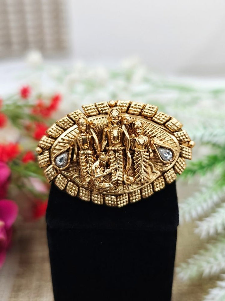 The Ramratan Ring featuring a traditional gold Ring with Goddess Ram, Laxman and sita in the middle, along with Kundan, Bride showcasing a premium temple artificial Ring for wedding rituals. Traditional temple artificial Ring for her South Indian wedding ceremony.