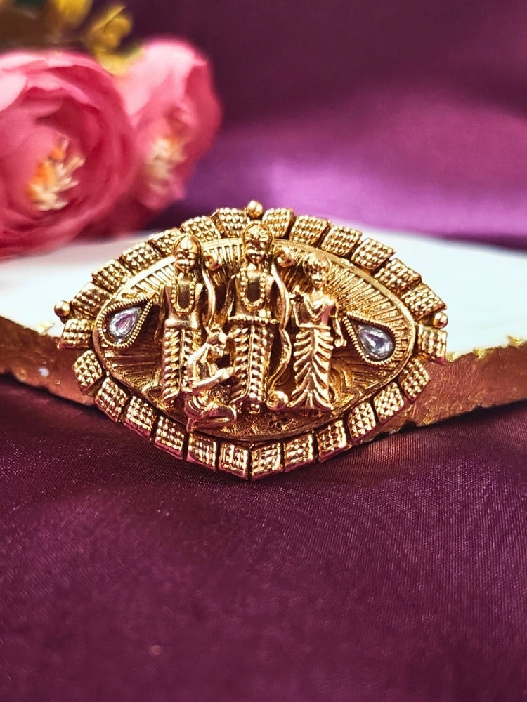 The Ramratan Ring featuring a traditional gold Ring with Goddess Ram, Laxman and sita in the middle, along with Kundan, Bride showcasing a premium temple artificial Ring for wedding rituals. Traditional temple artificial Ring for her South Indian wedding ceremony.
