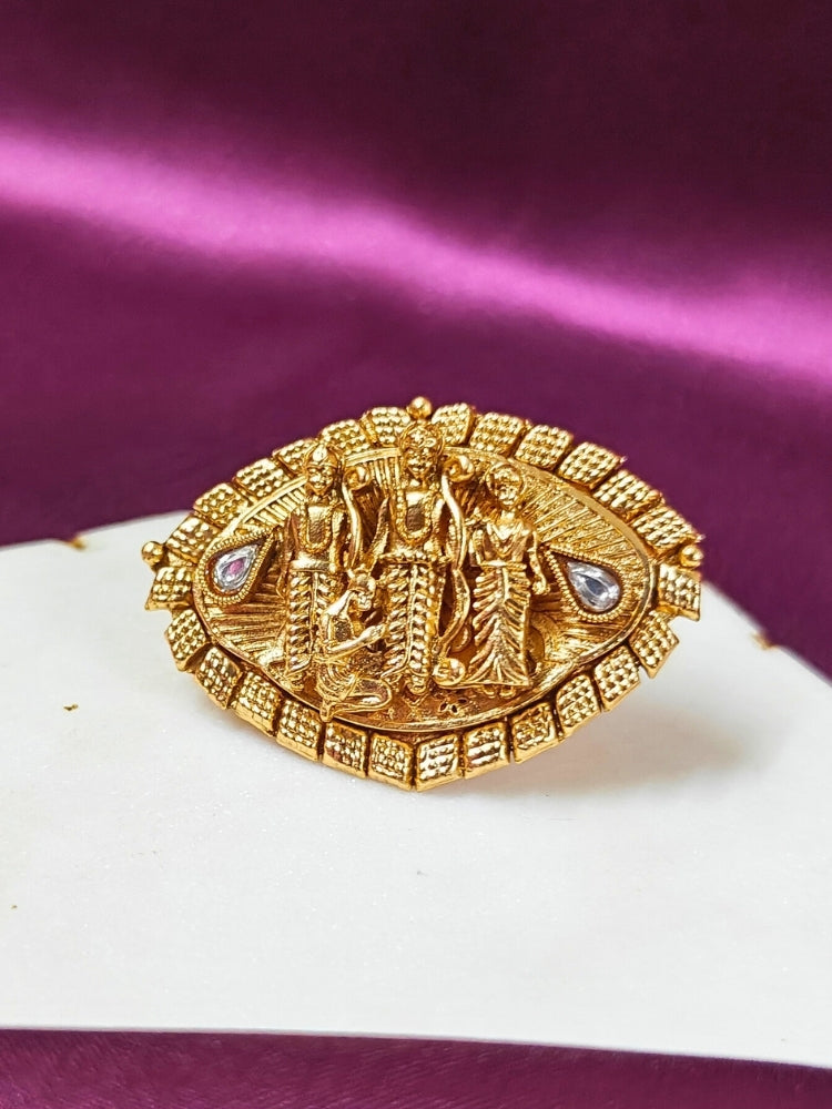 The Ramratan Ring featuring a traditional gold Ring with Goddess Ram, Laxman and sita in the middle, along with Kundan, Bride showcasing a premium temple artificial Ring for wedding rituals. Traditional temple artificial Ring for her South Indian wedding ceremony.