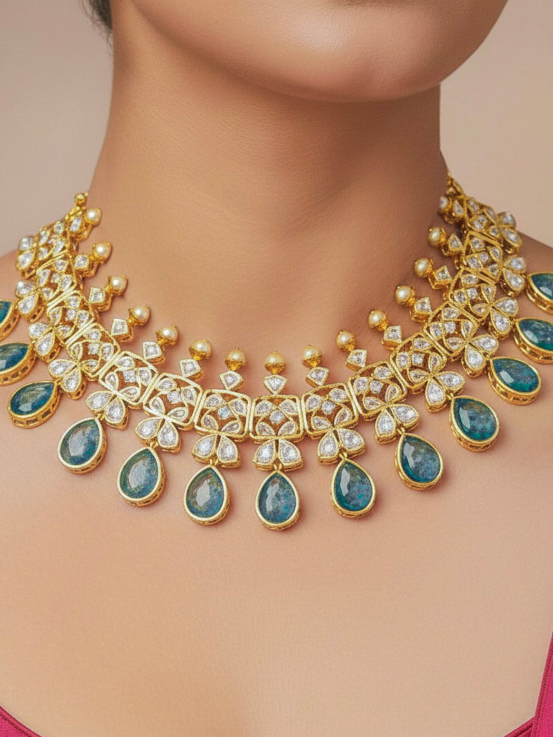 Close-up of a woman wearing an ornate traditional (Gold Polish) Blue Collar jewellery set and earrings with Diamond Polki, Monalisa Stone and Colored Stones. Wedding guest wearing a sparkling American diamond necklace with a saree. A graceful woman wearing a trending American diamond necklace for a 2026 wedding celebration.