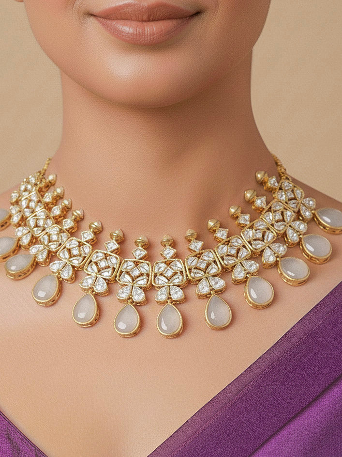 Close-up of a woman wearing an ornate traditional (Gold Polish) Grey Collar jewellery set and earrings with Diamond Polki, Monalisa Stone and Colored Stones. Wedding guest wearing a sparkling American diamond necklace with a saree. A graceful woman wearing a trending American diamond necklace for a 2026 wedding celebration.