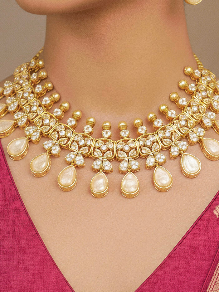 Close-up of a woman wearing an ornate traditional (Gold Polish) Ivory Collar jewellery set and earrings with Diamond Polki, Monalisa Stone and Colored Stones. Wedding guest wearing a sparkling American diamond necklace with a saree. A graceful woman wearing a trending American diamond necklace for a 2026 wedding celebration.