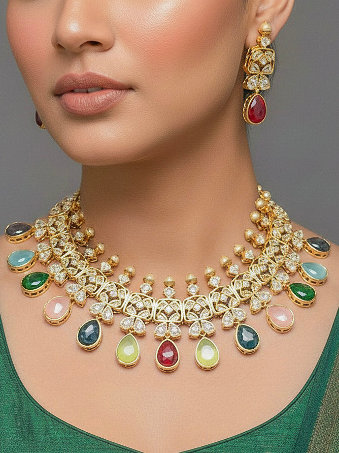 Close-up of a woman wearing an ornate traditional (Gold Polish) Multi-Color Collar jewellery set and earrings with Diamond Polki, Monalisa Stone and Colored Stones. Wedding guest wearing a sparkling American diamond necklace with a saree. A graceful woman wearing a trending American diamond necklace for a 2026 wedding celebration.